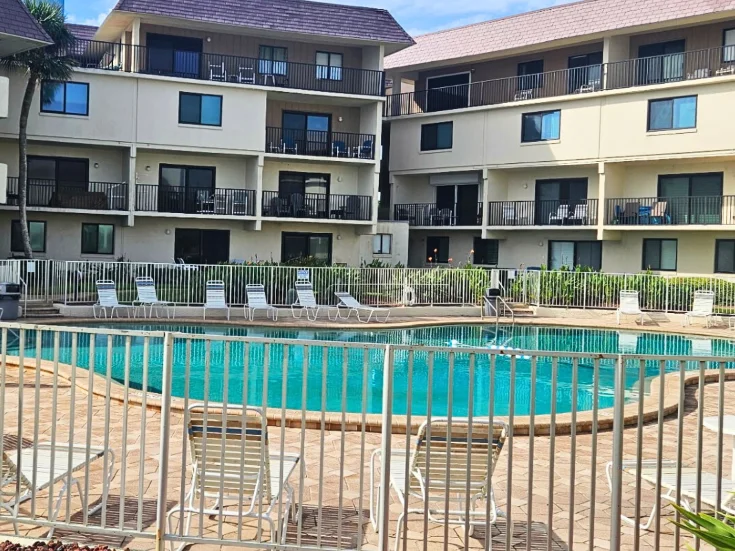 Heated community pool at The Bent Palm Club2
